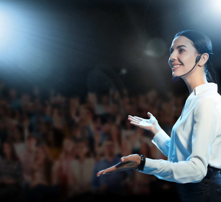 Motivational,Speaker,With,Headset,Performing,On,Stage